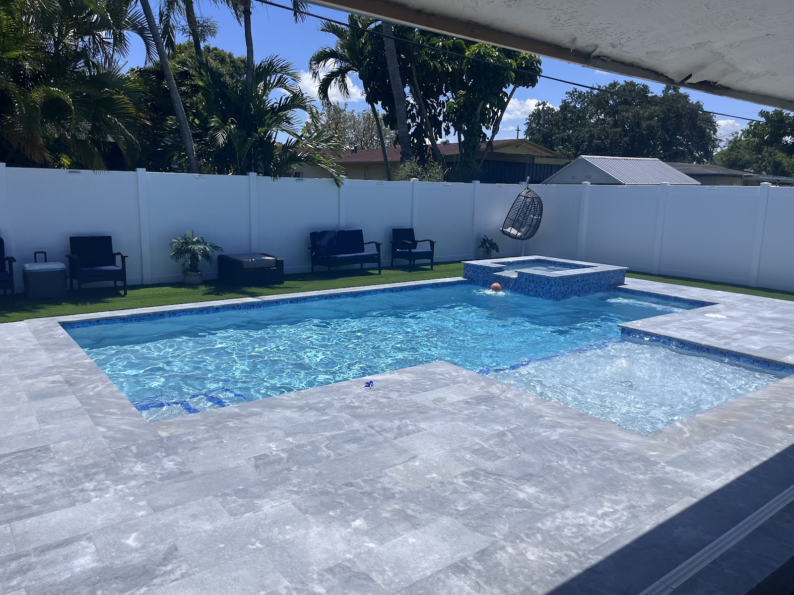 Finished pool with spa and stone deck